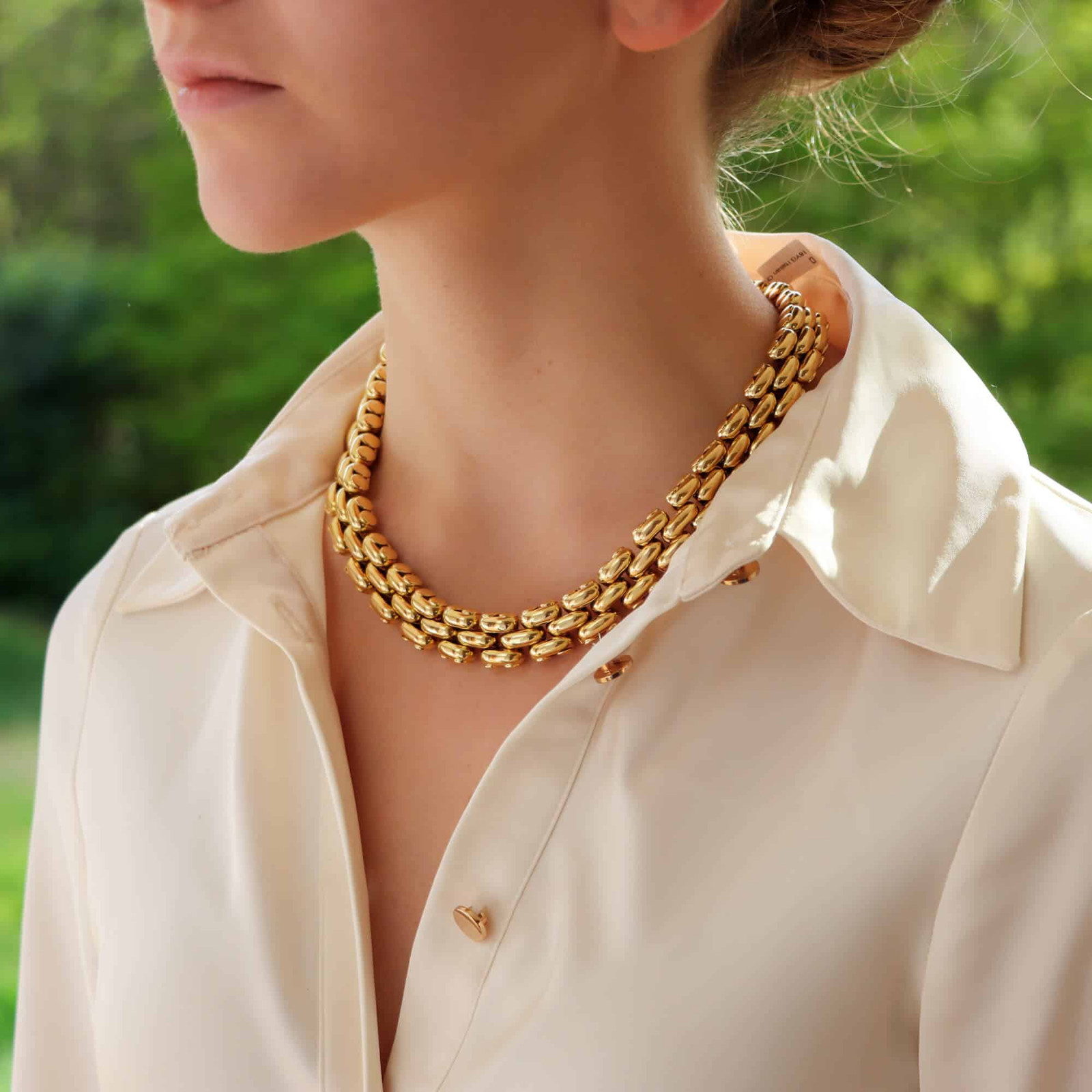 Multi-Strand Chunky Gold Necklace with Cream Blouse — Chunky Gold Necklaces