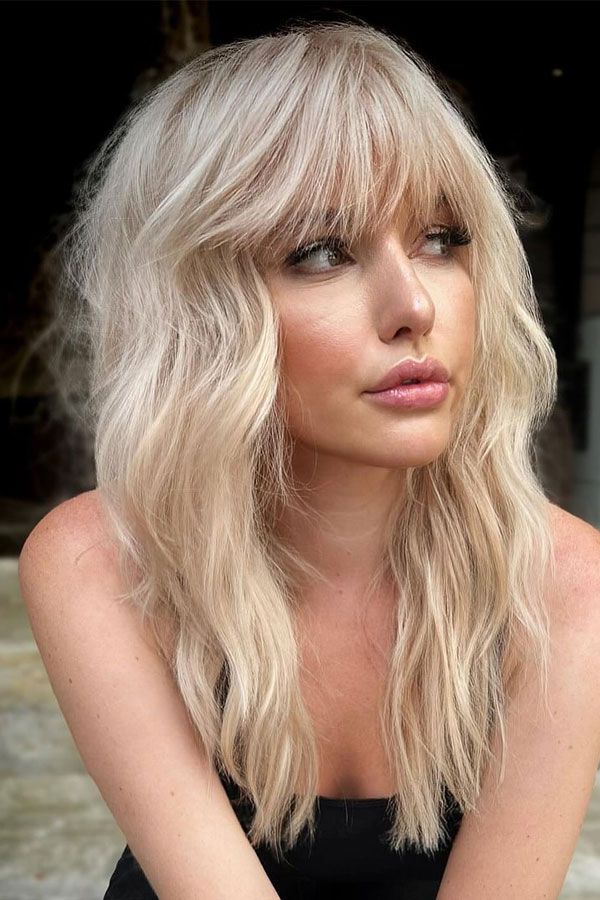 Platinum Blonde Shag With Wispy Curtain Bangs Platinum Blonde Shag With Wispy Curtain Bangs — Shag Haircut