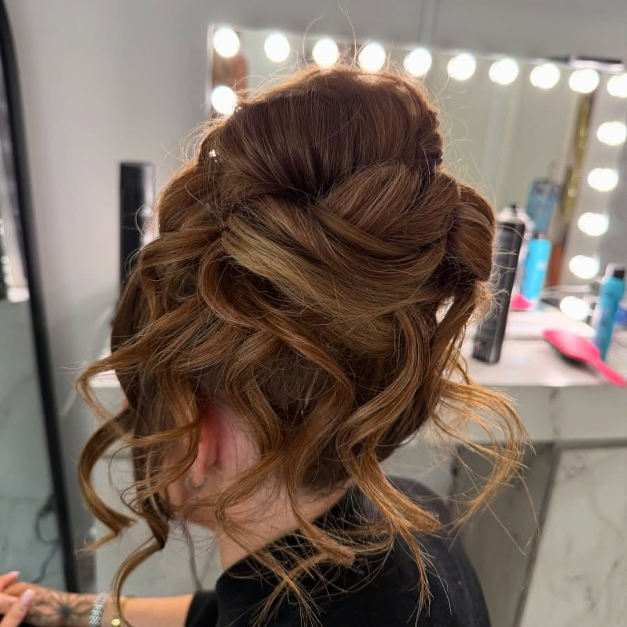 Textured Low Bun with Loose Finish — Updos for Medium Hair