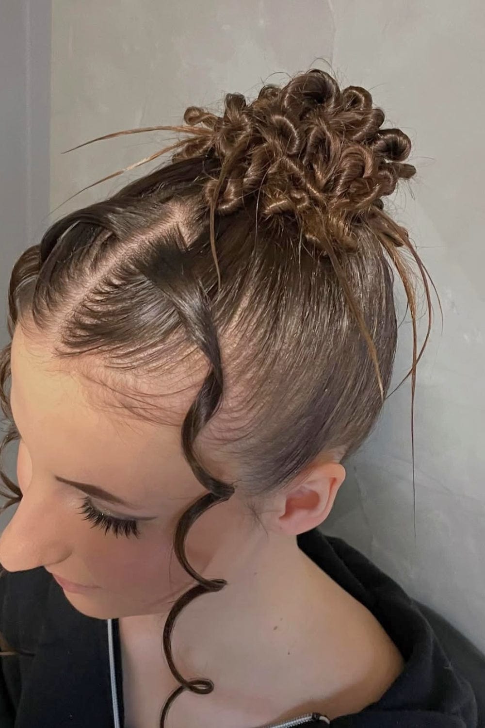 High Twisted Bun with Tendrils High Twisted Bun with Tendrils — Formal Hairstyles