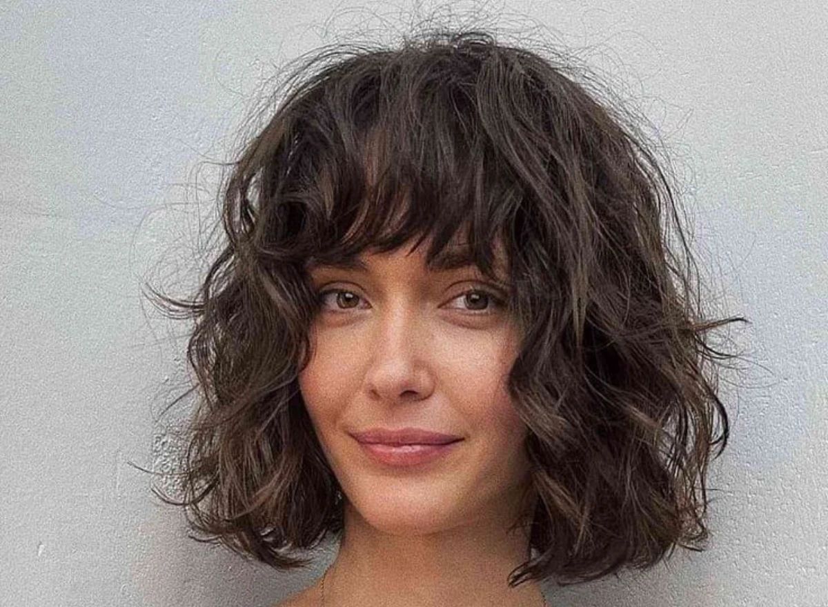 Shoulder Length Shag With Wispy Bangs — Haircuts for Wavy Hair