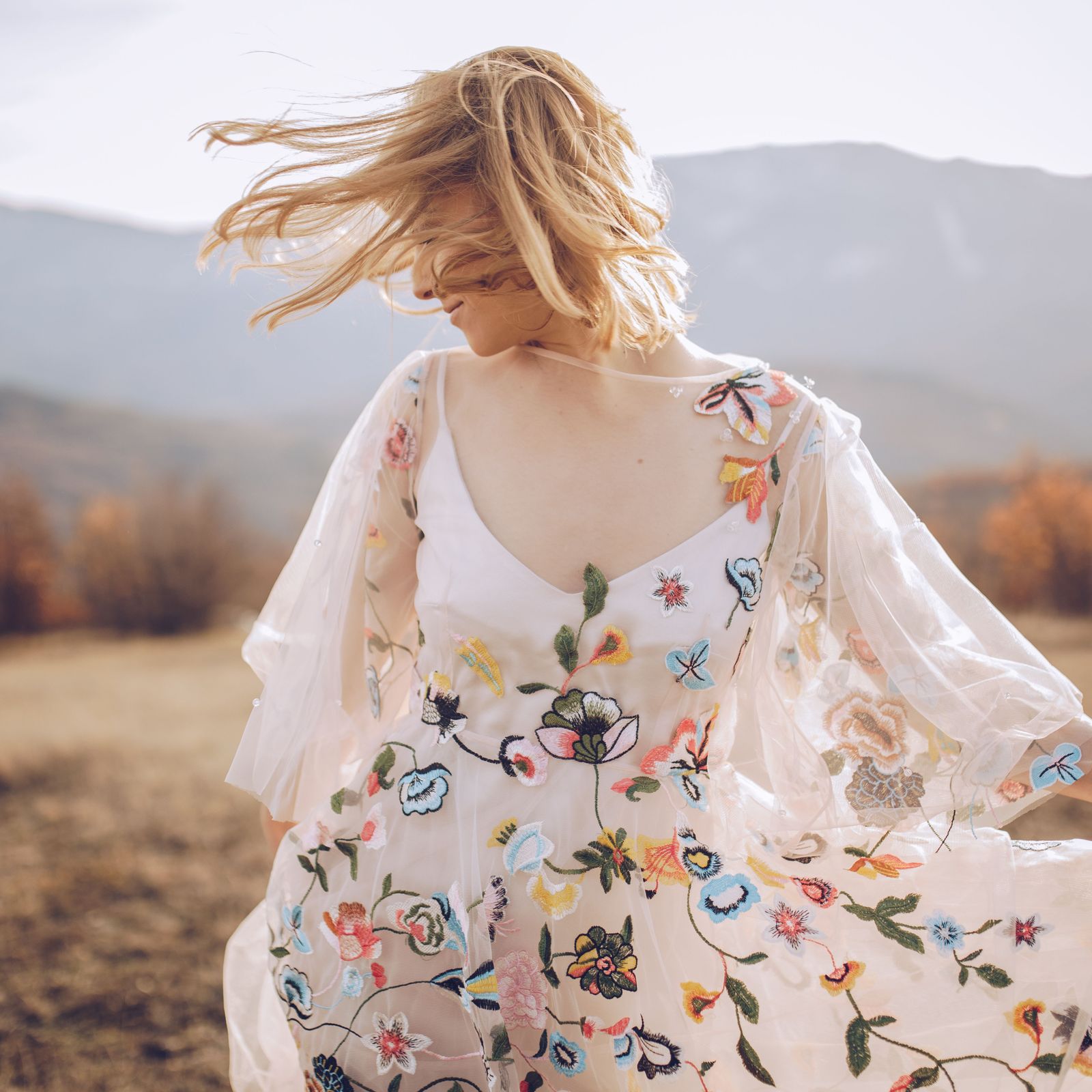 White Tiered Maxi Dress with Puff Sleeves and Blue Floral Print — Floral Dresses