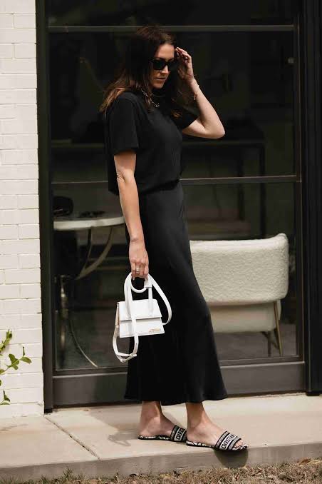 Minimalist Black Midi Dress Over a T-Shirt with Patterned Slides — Black and White Outfits