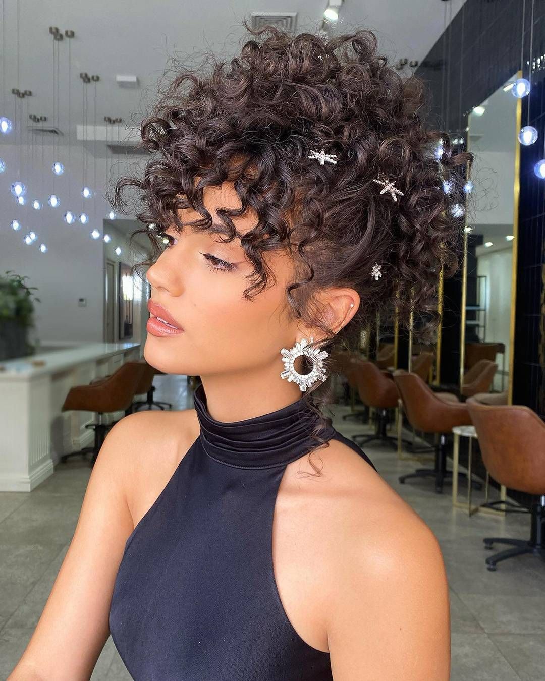 Voluminous Curly Updo With Star Pins Voluminous Curly Updo With Star Pins — Wedding Hairstyles for Black Women