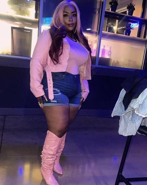 Distressed Denim Shorts with Pink Cropped Jacket and Boots Distressed Denim Shorts with Pink Cropped Jacket and Boots — Outfits for Big Thighs