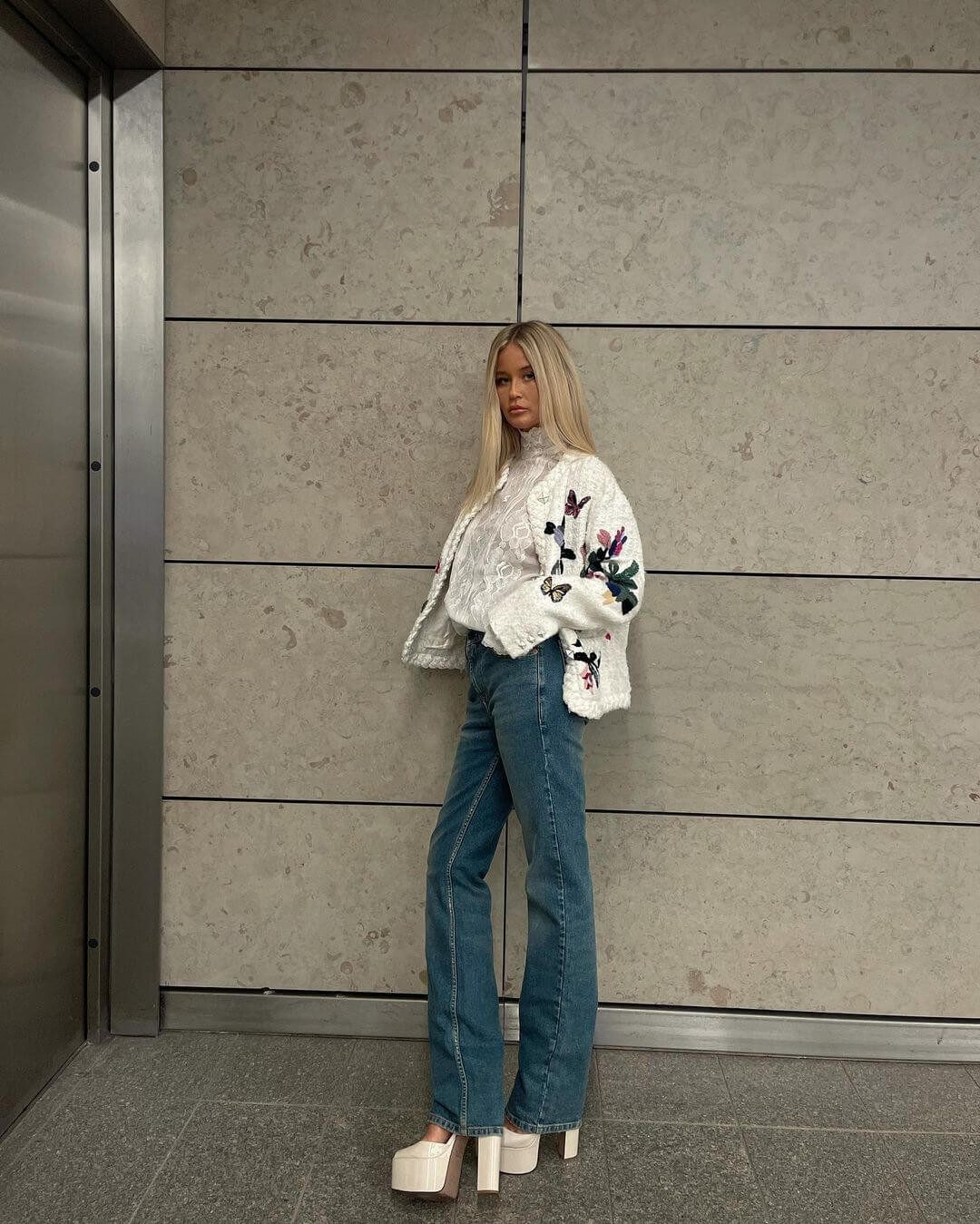 Blue Jeans, Lace Top, Embroidered Jacket, and White Platform Heels — Heels with Jeans Outfits