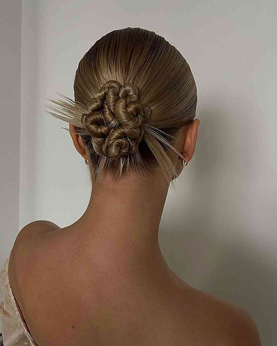Sculpted Blonde Bun with Spikes Sculpted Blonde Bun with Spikes — Ballet Hairstyles