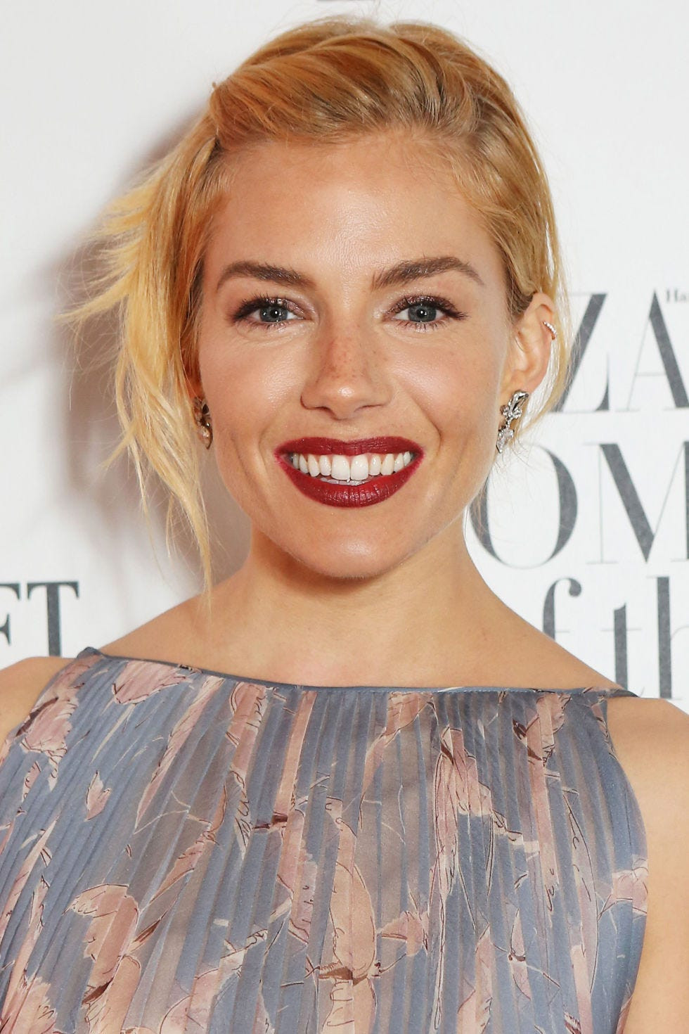 Mid-Back Red Waves With Face-Framing Bangs — Hairstyles for Growing Out Bangs