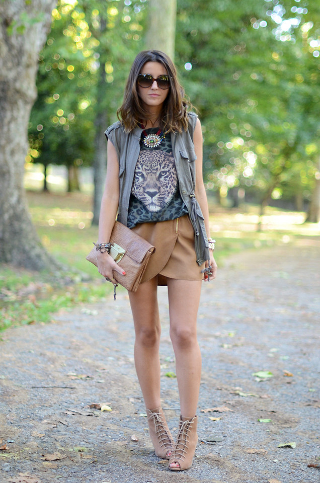 Casual Utility Vest and Skirt with a Tan Envelope Clutch — Clutch Outfits