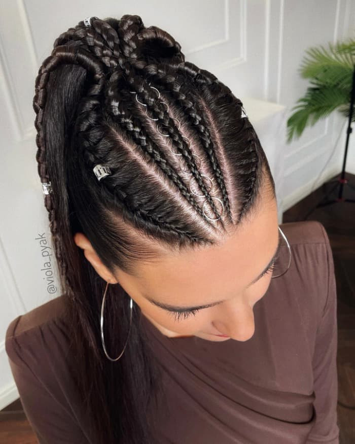 High Cornrow Ponytail With Metallic Rings High Cornrow Ponytail With Metallic Rings