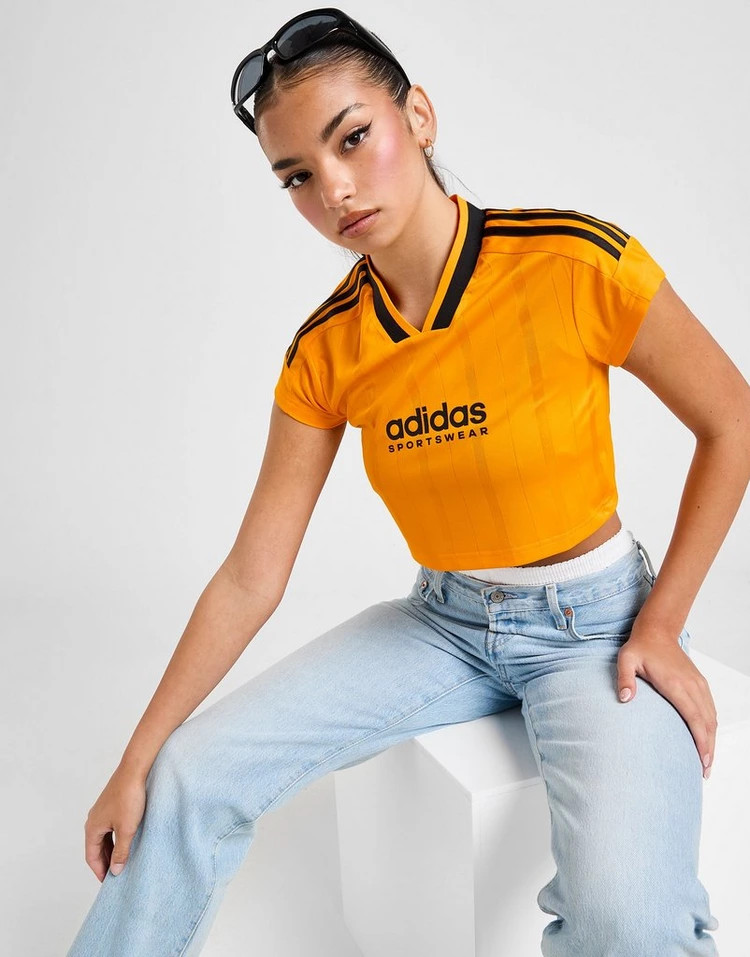 Orange Soccer Jersey Tucked into Jeans Orange Soccer Jersey Tucked into Jeans — Blokecore Outfits
