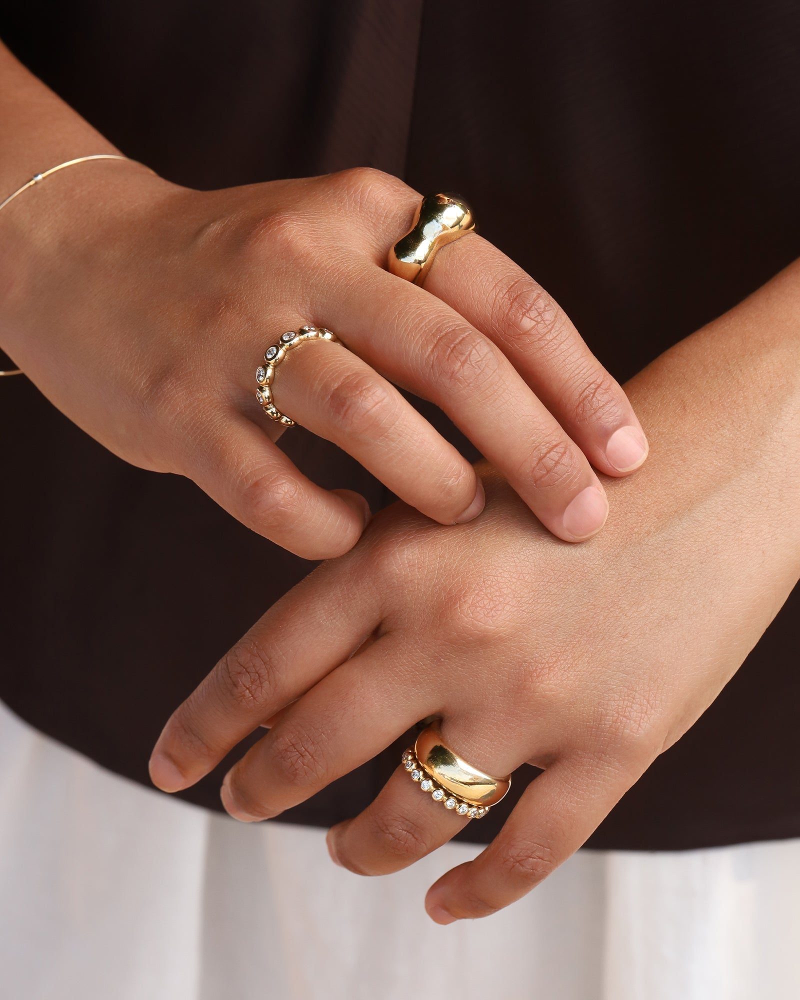 Curved Gold Ring Stack with Clear Stones Curved Gold Ring Stack with Clear Stones — Stacked Rings