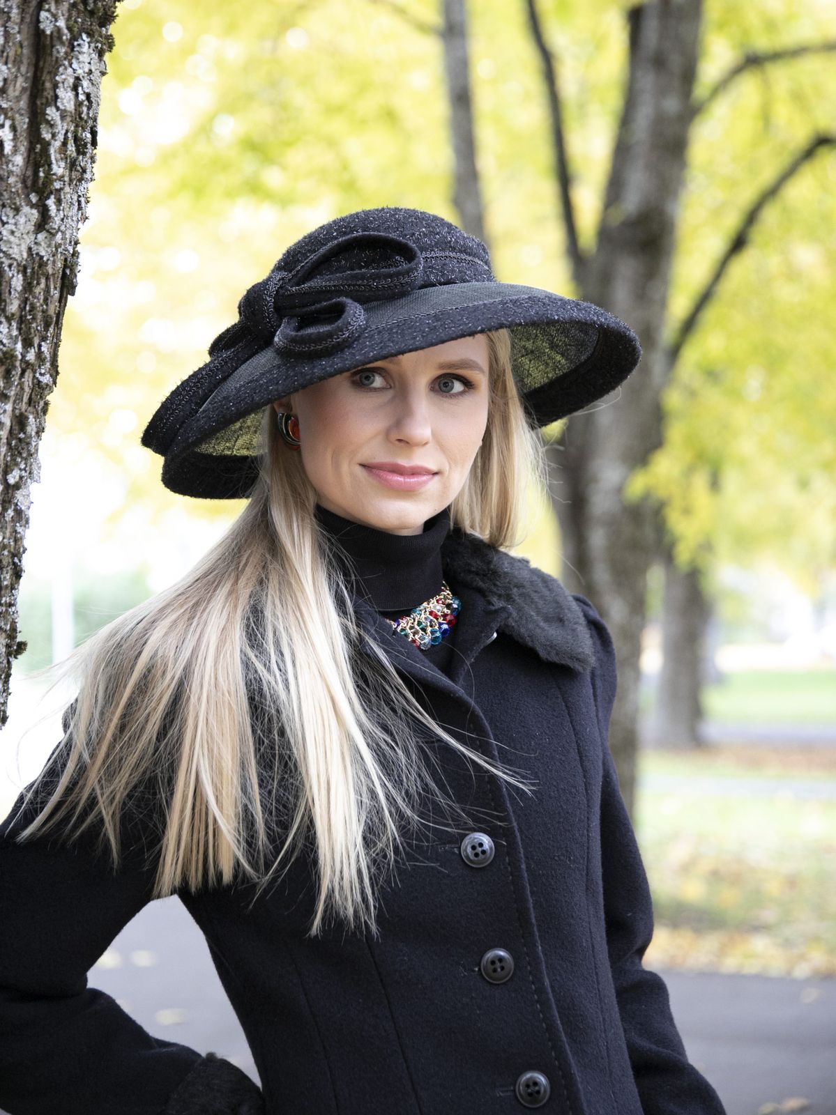 Black Hat with Bow, Wool Coat, and Statement Necklace Black Hat with Bow, Wool Coat, and Statement Necklace — Wide Brim Hat Outfits