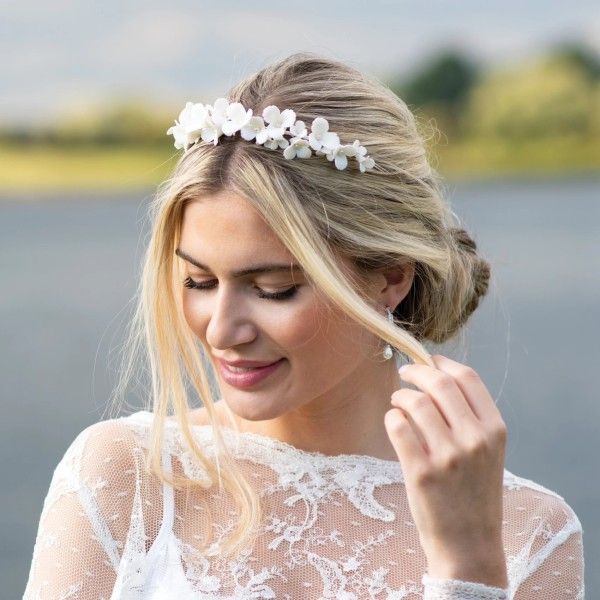 Low Bun with Crown Volume and Side Part — Wedding Hairstyles with Tiara