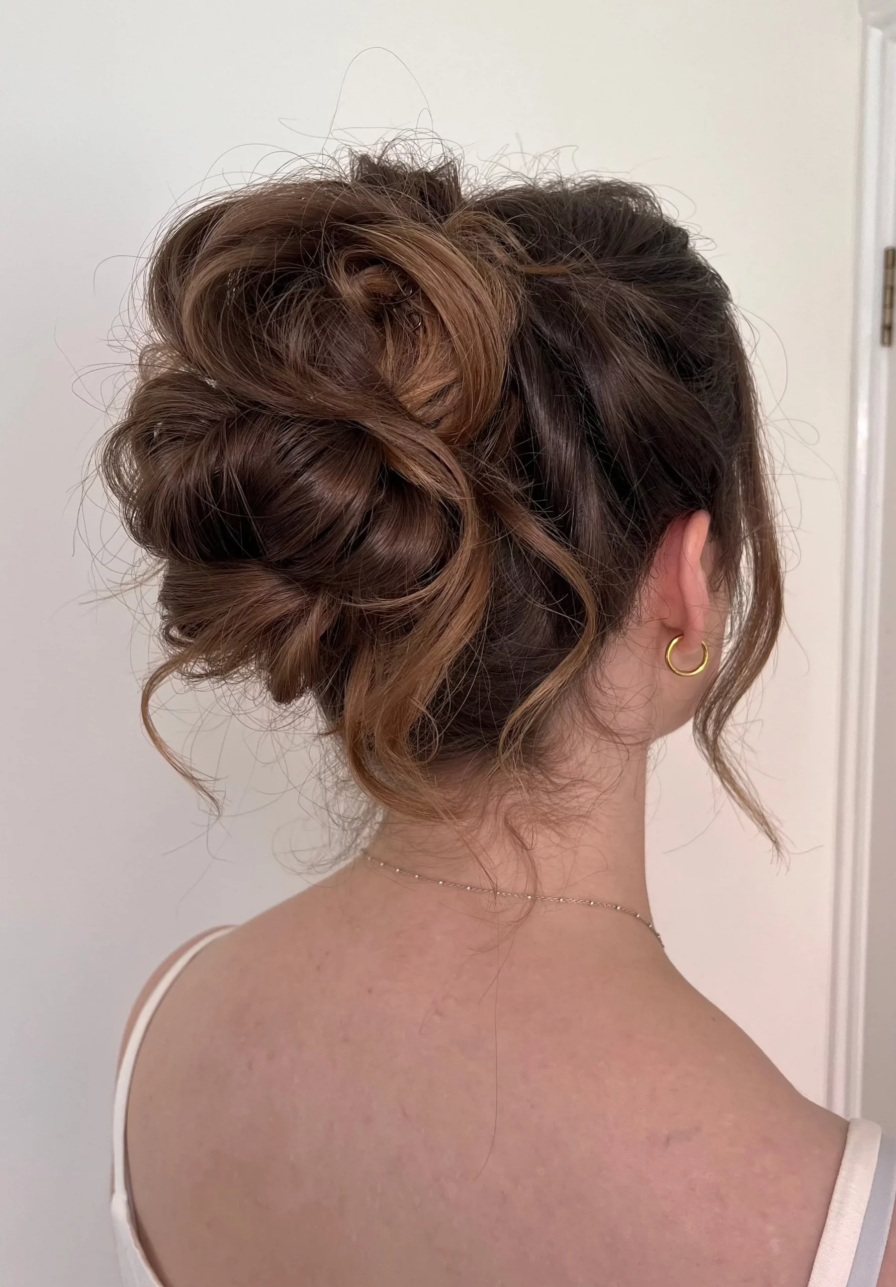 Medium Brown With Caramel Highlights Textured High Messy Bun Medium Brown With Caramel Highlights Textured High Messy Bun — Bun Hairstyles