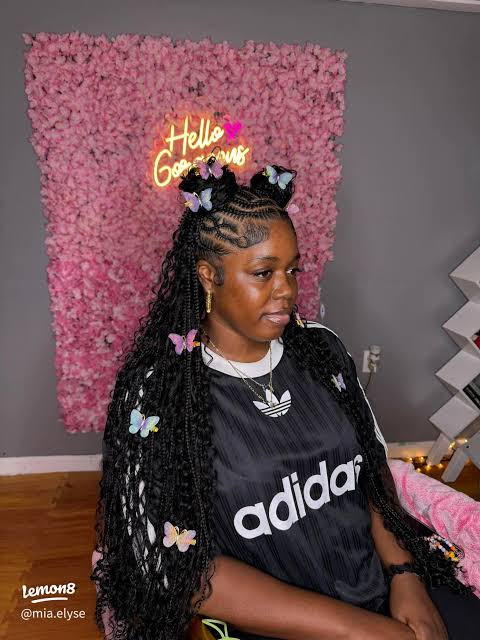 Funky Two Buns with Butterfly Clips Funky Two Buns with Butterfly Clips — Knotless Braids Bun