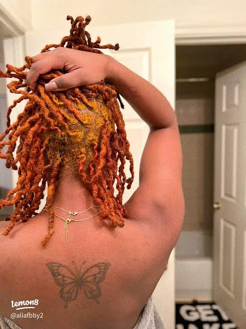 Back View Shoulder-Length Wavy Locs In Vibrant Ginger Back View Shoulder-Length Wavy Locs In Vibrant Ginger — Ginger Locs