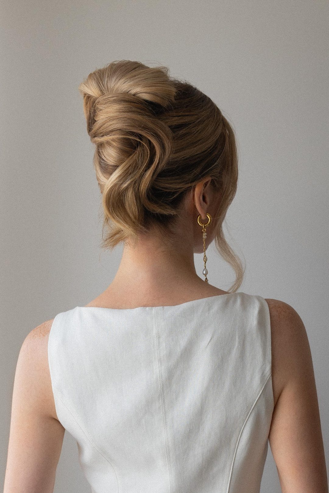 Polished Light Blonde Sculpted Updo Polished Light Blonde Sculpted Updo — Updos for Long Hair