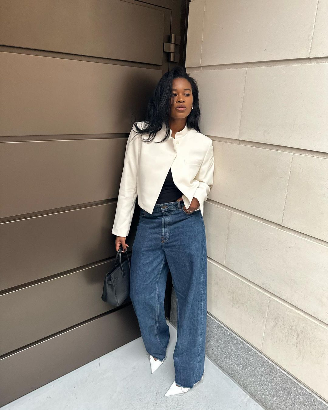 Wide Leg Jeans with a Cropped White Jacket and Black Tank