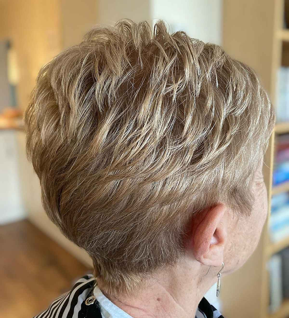 Ash Blonde With Subtle Highlights Textured Ash Blonde Pixie Ash Blonde With Subtle Highlights Textured Ash Blonde Pixie — Hair Color for Women Over 70