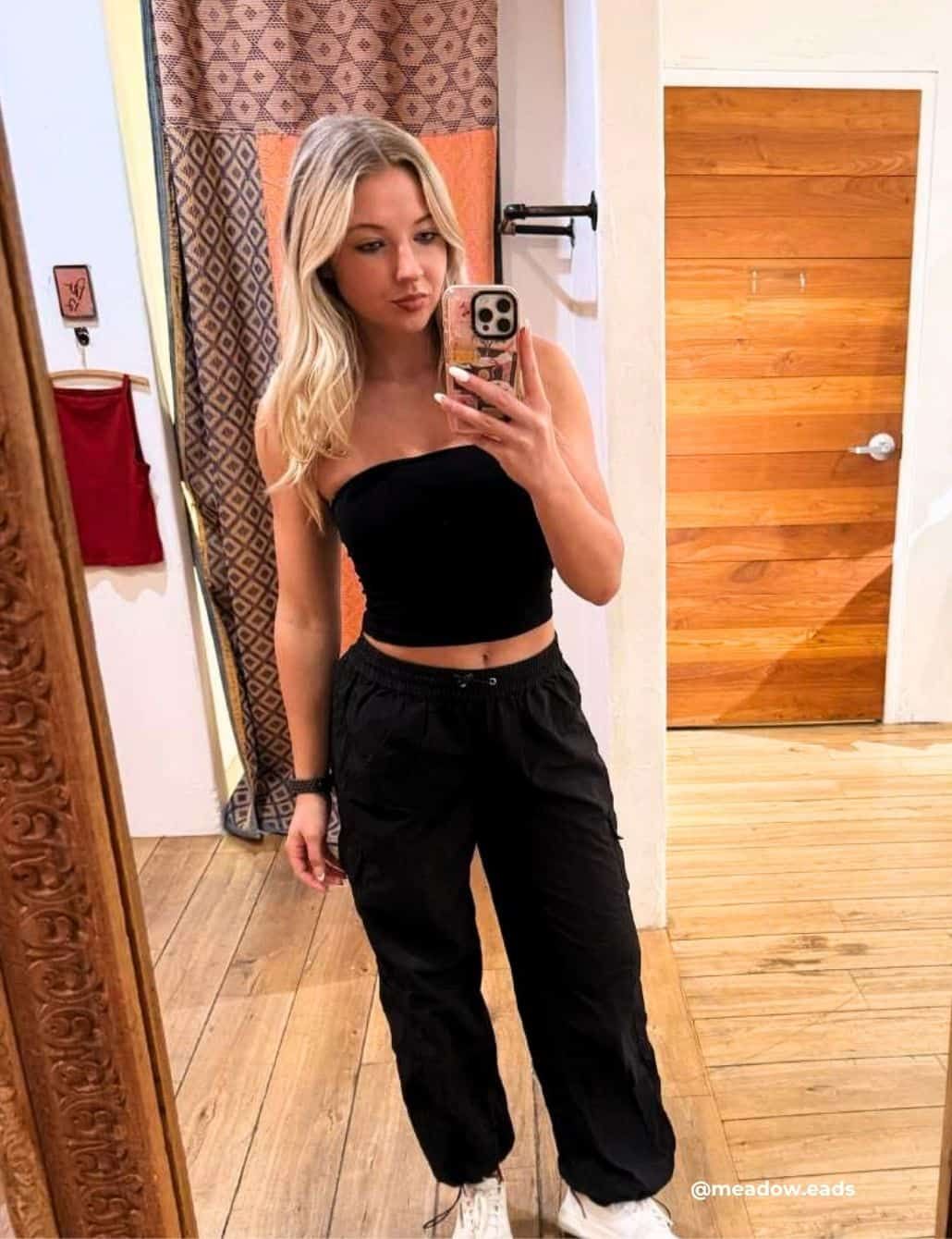 Black Tube Top with Black Cargo Pants and White Sneakers Black Tube Top with Black Cargo Pants and White Sneakers — Tube Top Outfits