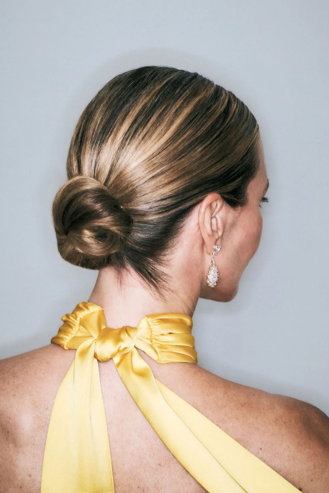 Collarbone Visual Idea — Sleek Low Bun