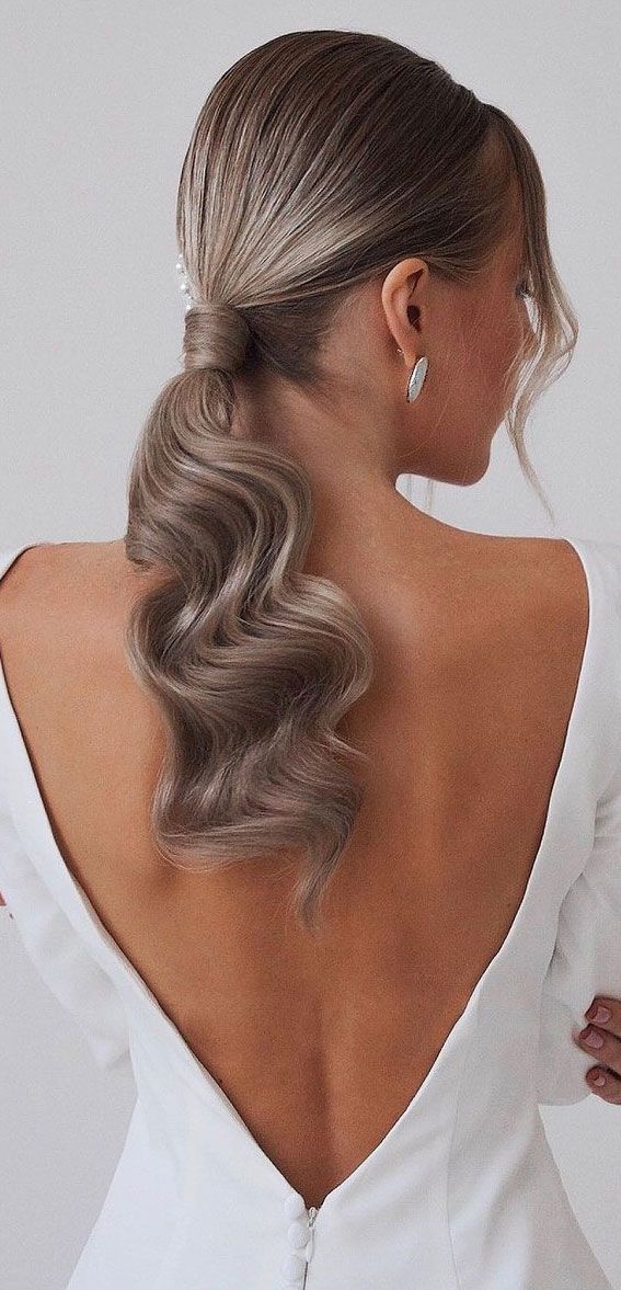 Ash Blonde Low Ponytail With Loose Waves — Sleek Low Ponytail