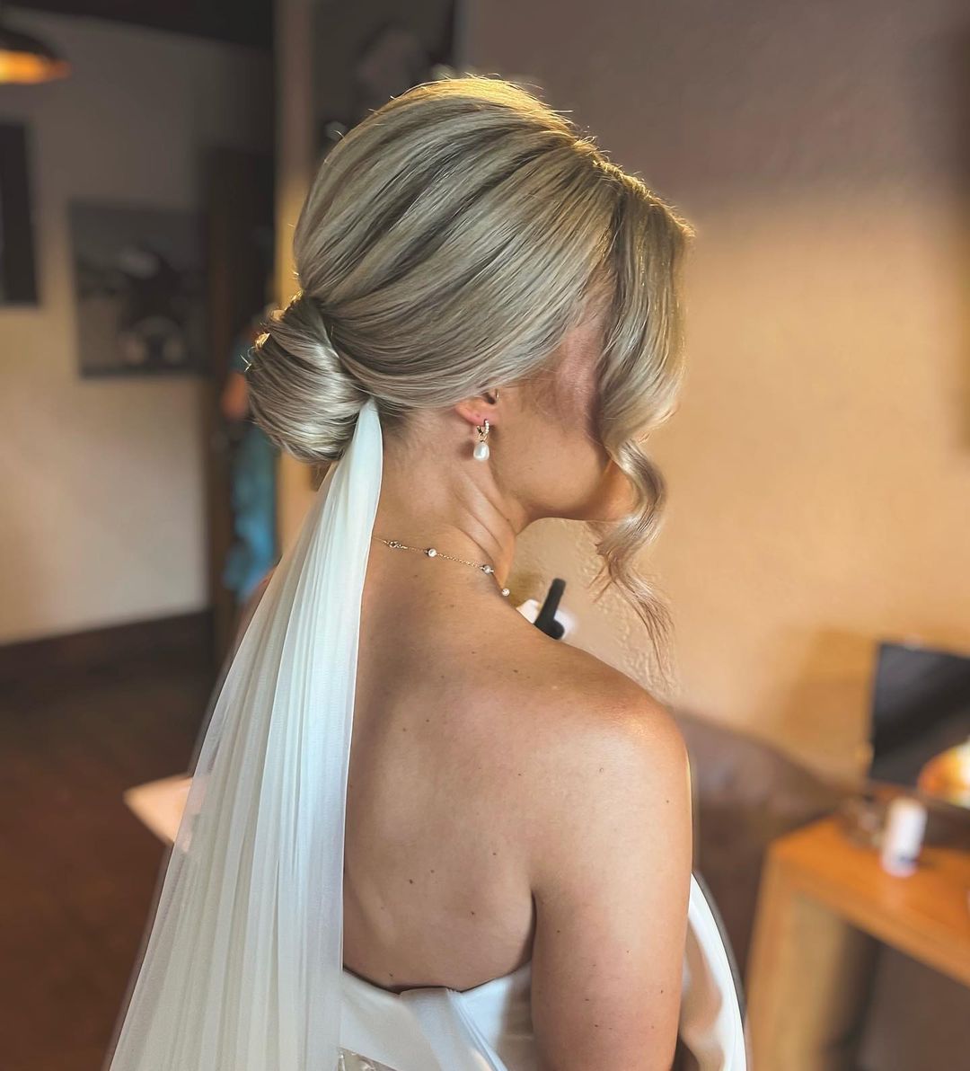 Rolled Ash Blonde Low Bun with Veil — Wedding Low Bun
