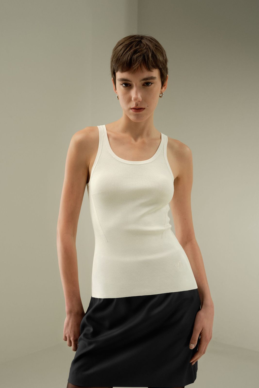 Minimalist Chic: White Ribbed Tank with Dark Grey Skirt — Tank Tops
