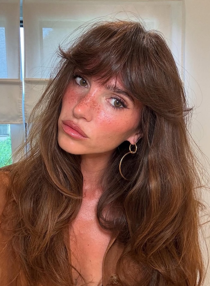 Brown Button-Up Top with Freckles and Gold Hoop Earrings — Bottleneck Bangs