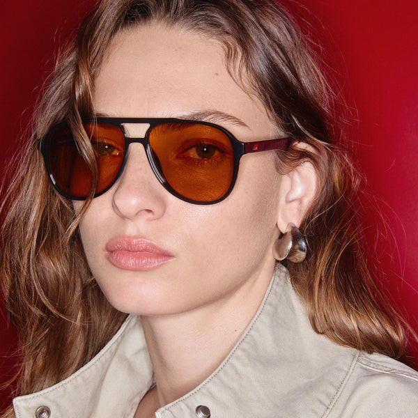 Black Aviators with Orange Lenses and Beige Jacket — Aviator Sunglasses Women