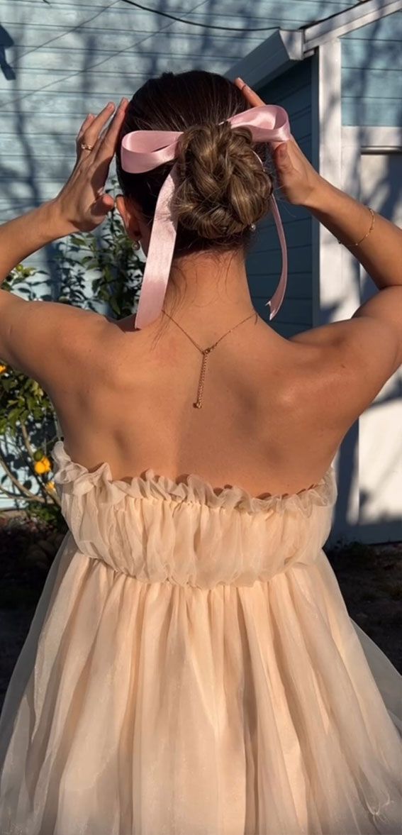 Visual Idea — Intricately Braided Bun Coquette Hairstyles