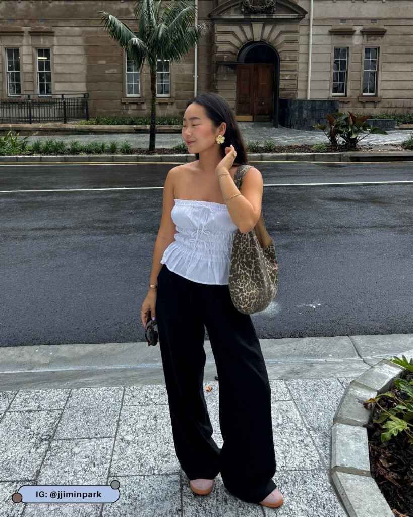 Ruched Strapless Peplum Top with High-Waisted Black Pants — Peplum Top Outfits