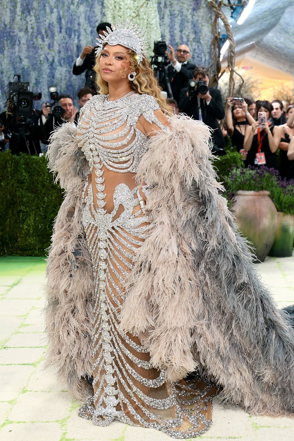 Skeletal Sequin Gown with Feathered Stole and Crown for a Show-Stopping Gala Skeletal Sequin Gown with Feathered Stole and Crown for a Show-Stopping Gala — Charity Gala Outfits