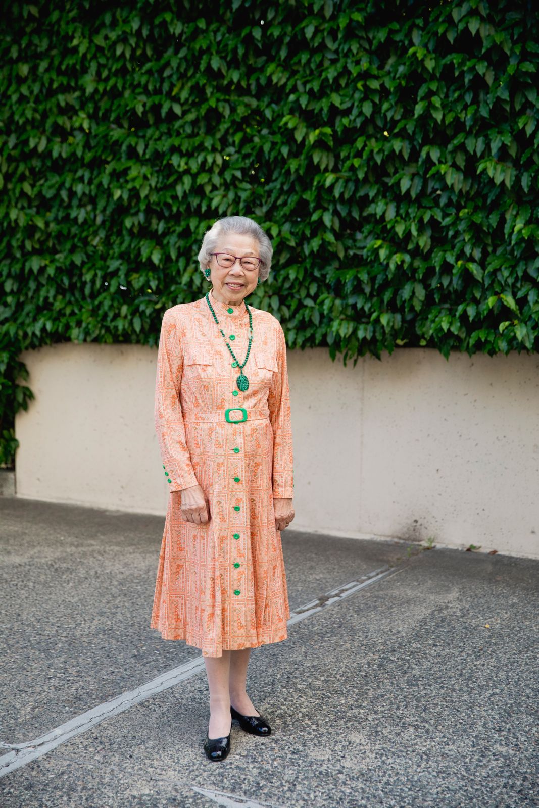 Elegant Evening: Orange Printed Dress with Green Accents — Grandma Outfits