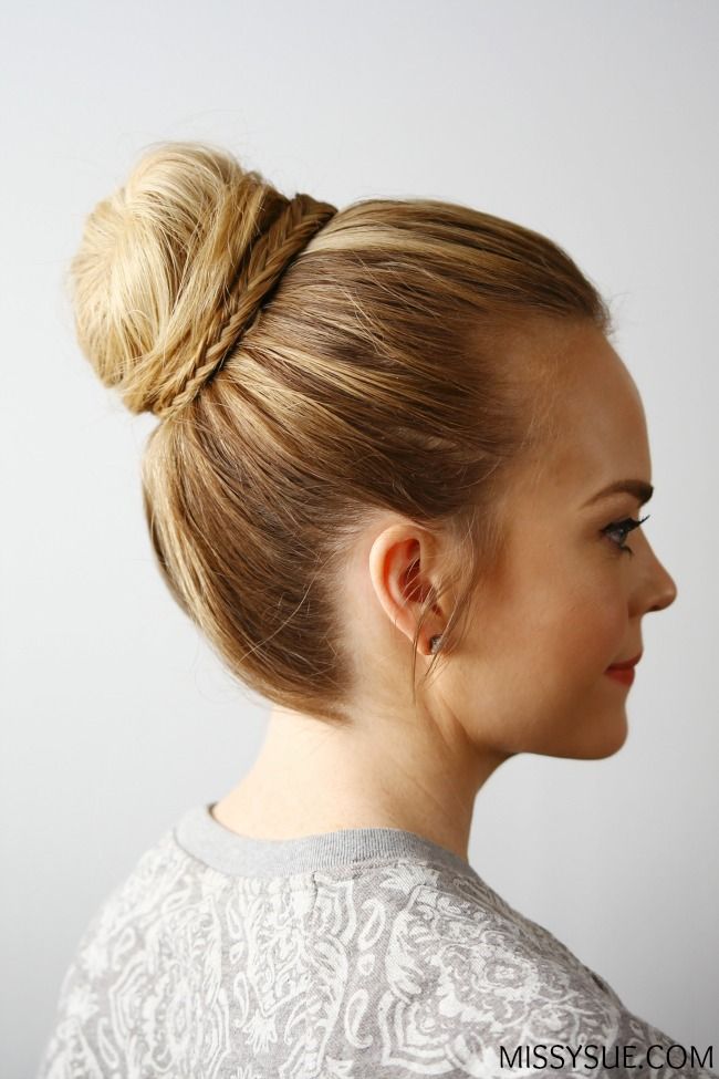 Sleek Blonde Top Knot With Braided Detail Sleek Blonde Top Knot With Braided Detail