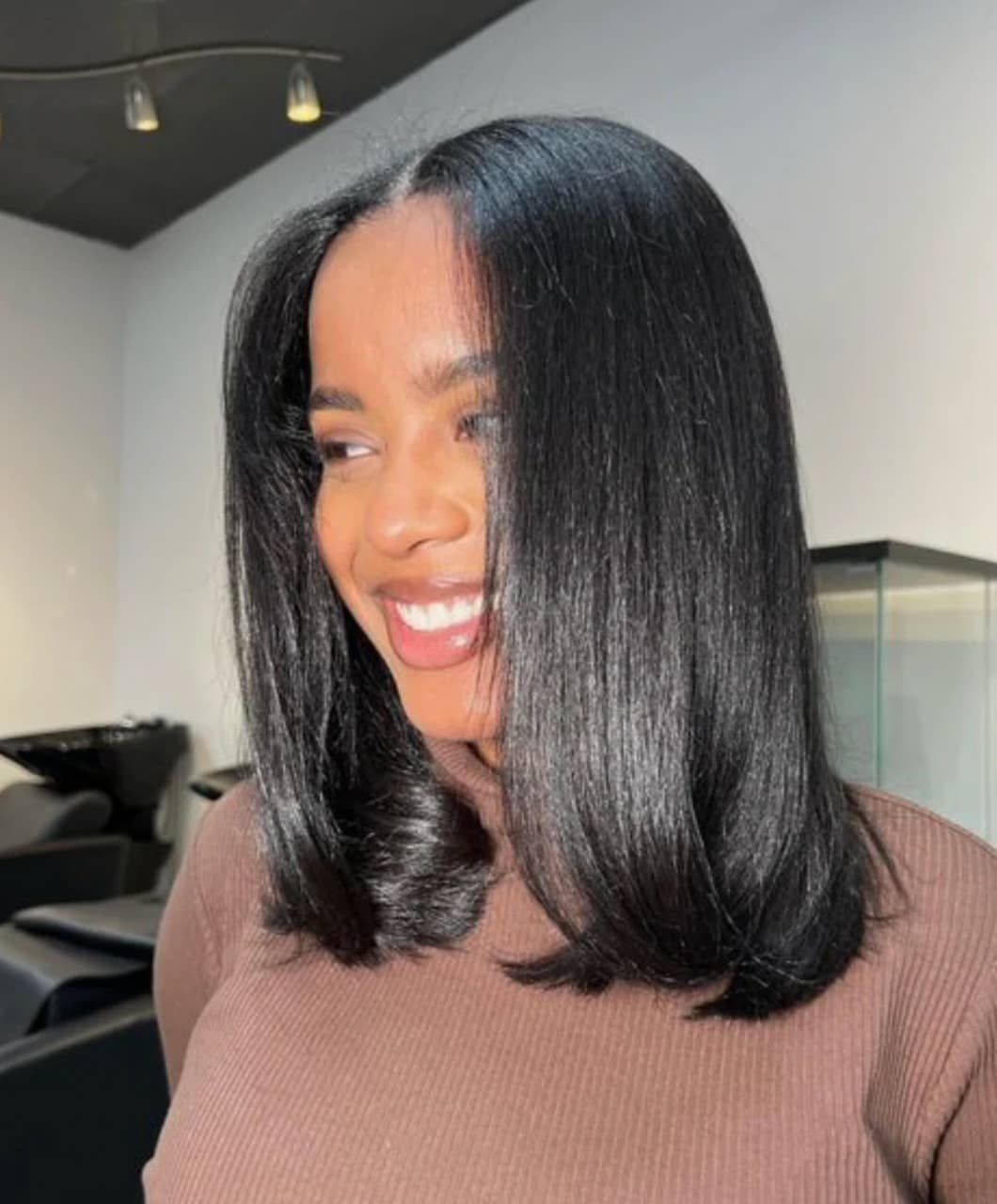 Sleek Collarbone Bob With Inward Curls — Silk Press with Layers