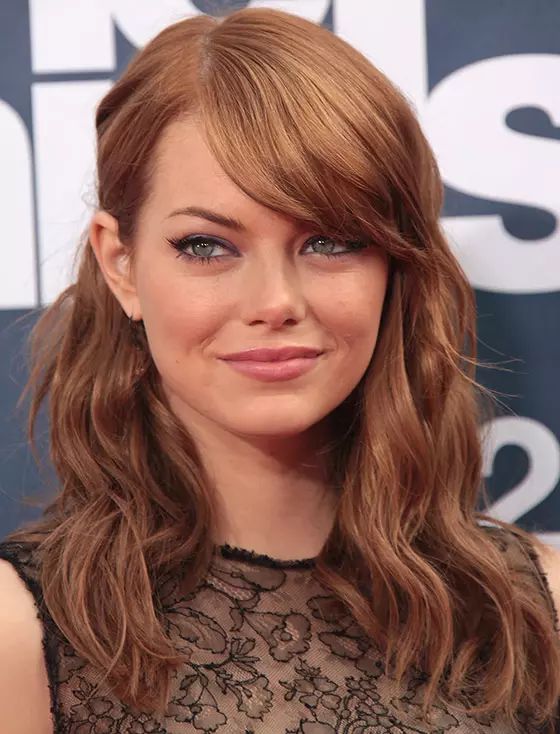 Medium Wavy With Side-Swept Bangs — Hairstyles for Big Forehead