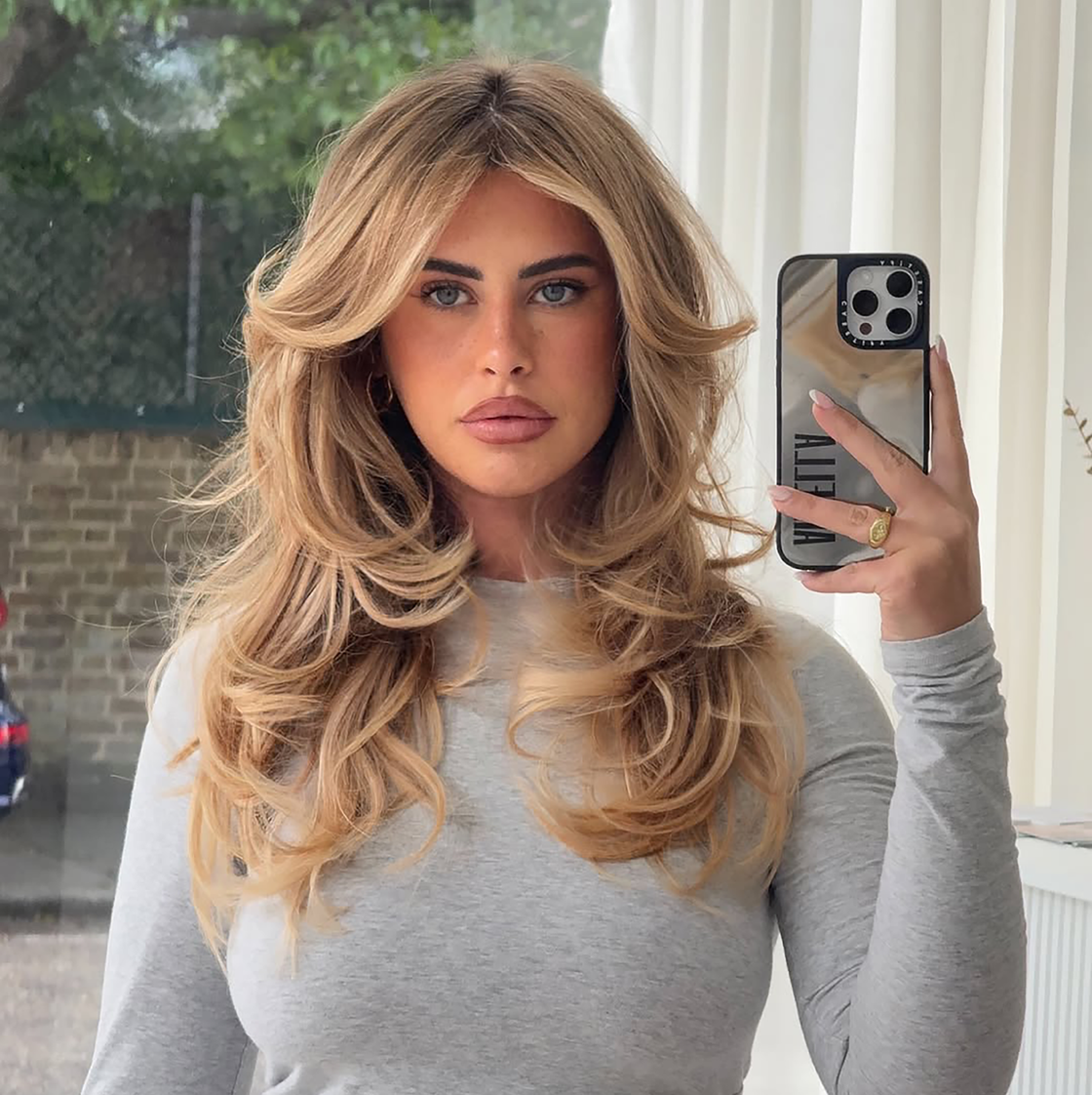 Voluminous Ash Blonde Waves With Face-Framing — Layered Hair