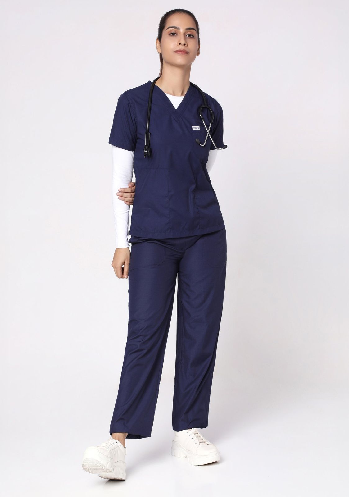 Navy Scrubs with White Undershirt and Stethoscope Navy Scrubs with White Undershirt and Stethoscope — Nurse Outfits