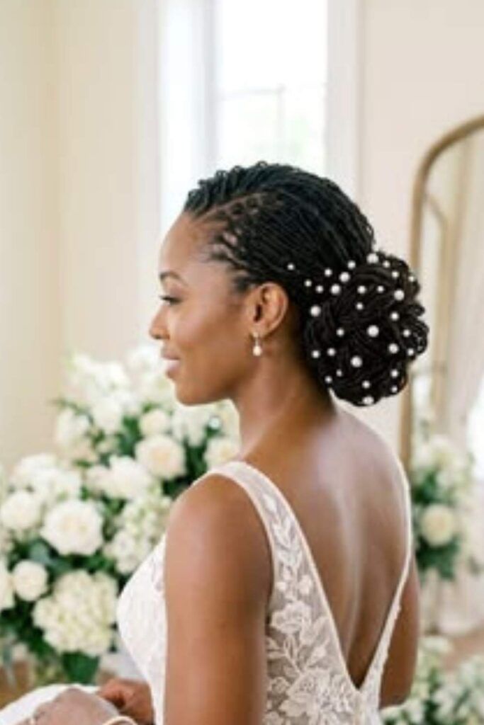 Elegant Updo With Pearl Embellishments — Natural Hair Wedding Styles