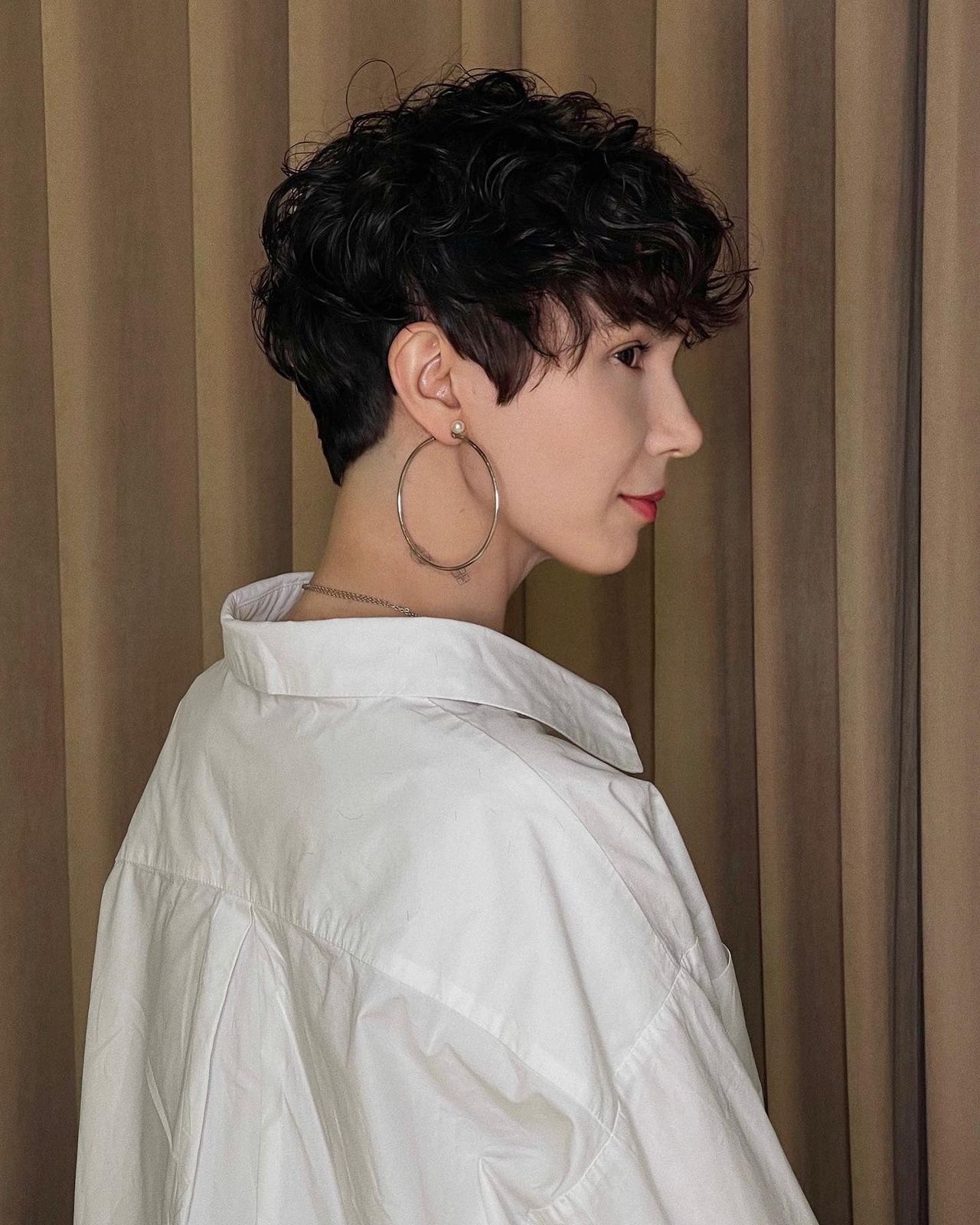 Bouncy Curly Pixie With Side Bangs
