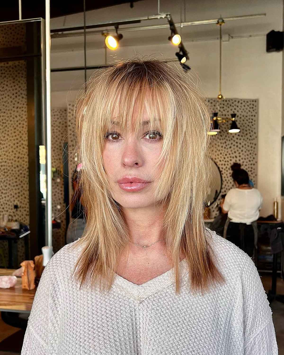 Ash Blonde Shag With Wispy Bangs — Choppy Layers