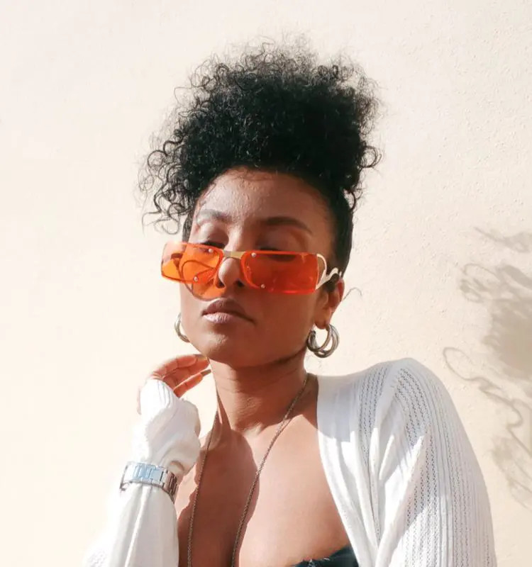 Vibrant Pop: Orange Rectangular Sunglasses with Knit Cardigan — Sunglasses for Oval Face