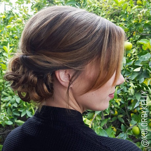 Mid-Back Visual Idea Mid-Back Visual Idea — Low Bun with Curtain Bangs