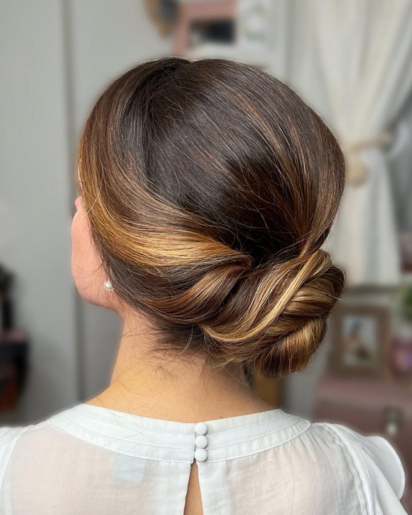 Smooth Dark Brown Blonde Highlighted Low Bun