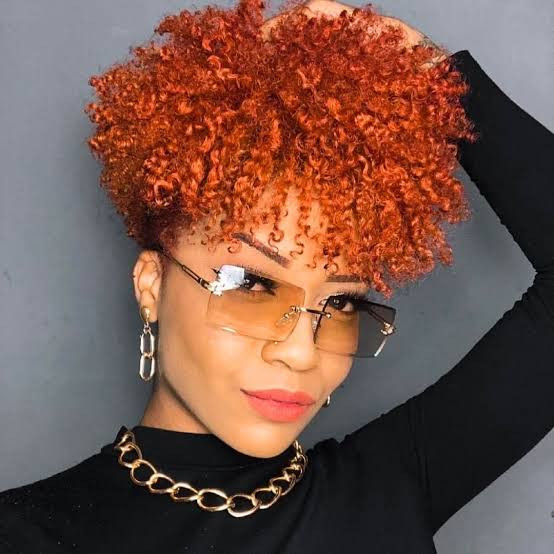 Vibrant Orange Tapered Afro Puff — Tapered Cut for Black Women