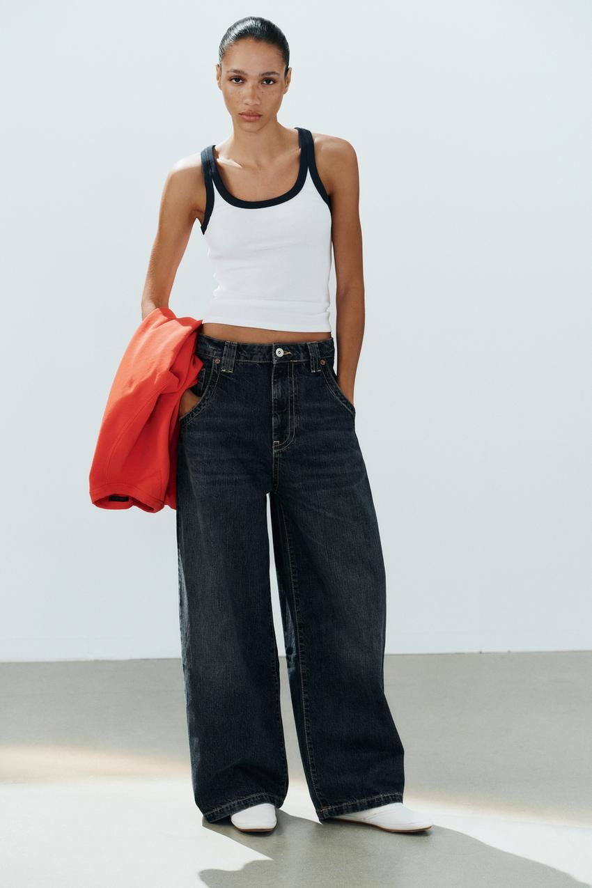 Layered Casual: White Tank with Navy Trim and Red Jacket — Tank Tops