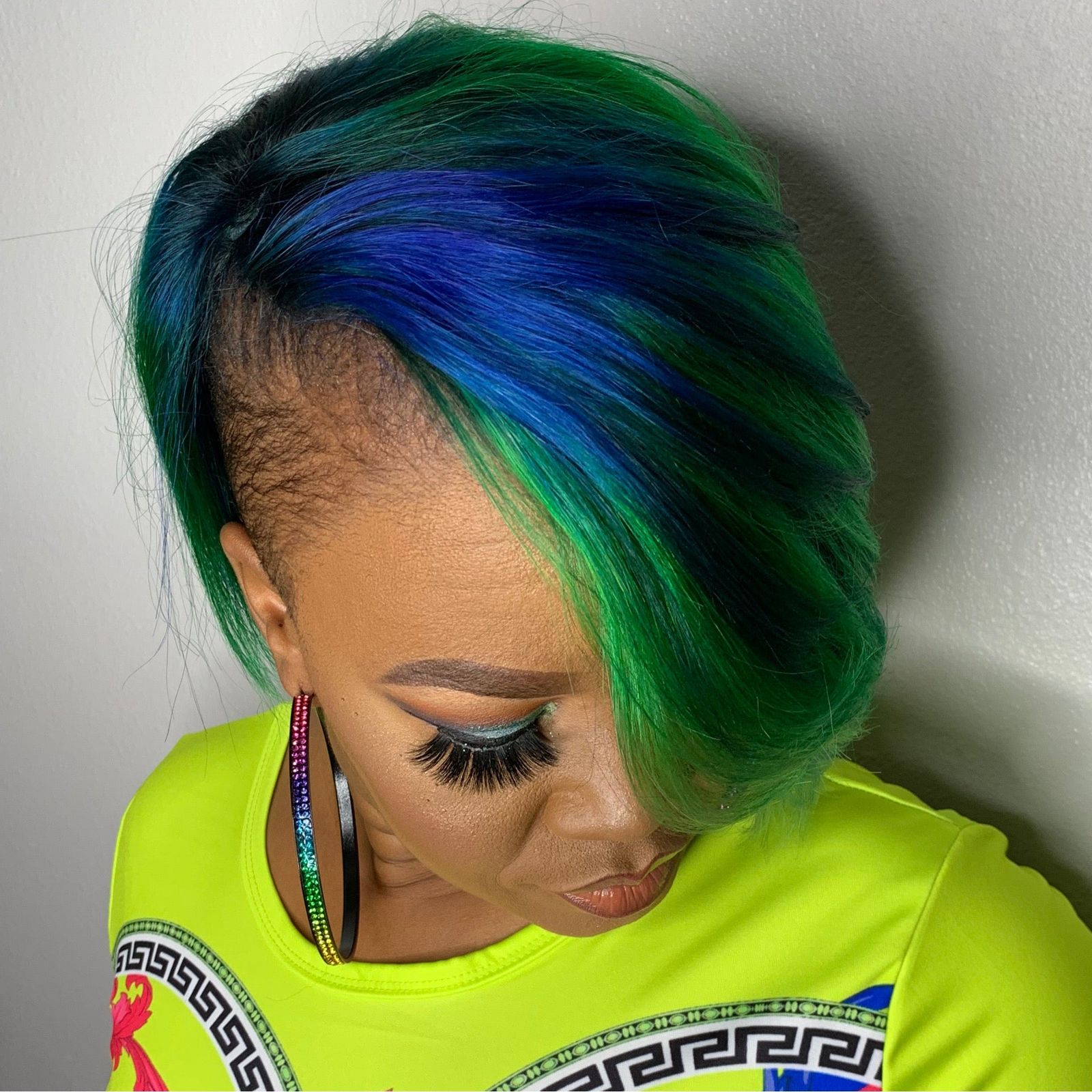 Short Layered Bob With Green Blue Highlights Short Layered Bob With Green Blue Highlights — Quick Weave Bob