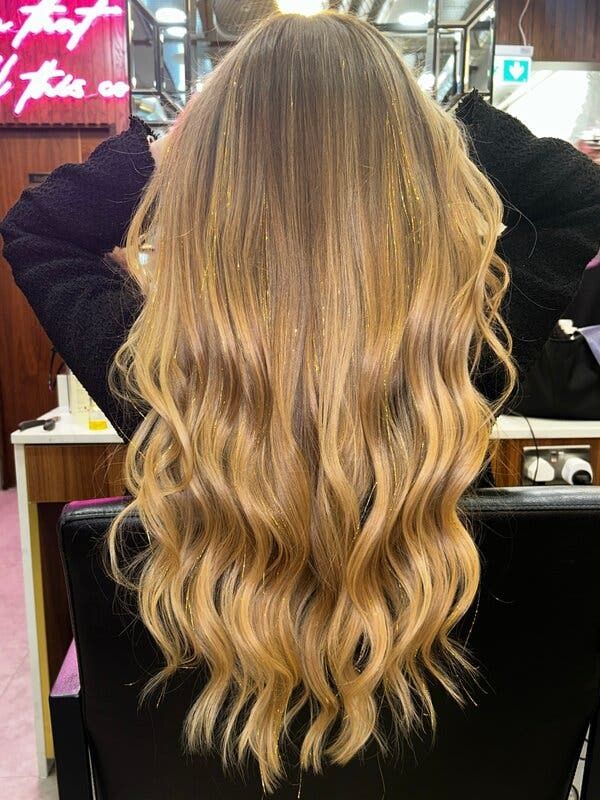 Festive Gold Tinsel on Long Blonde Hair — Hair Tinsel